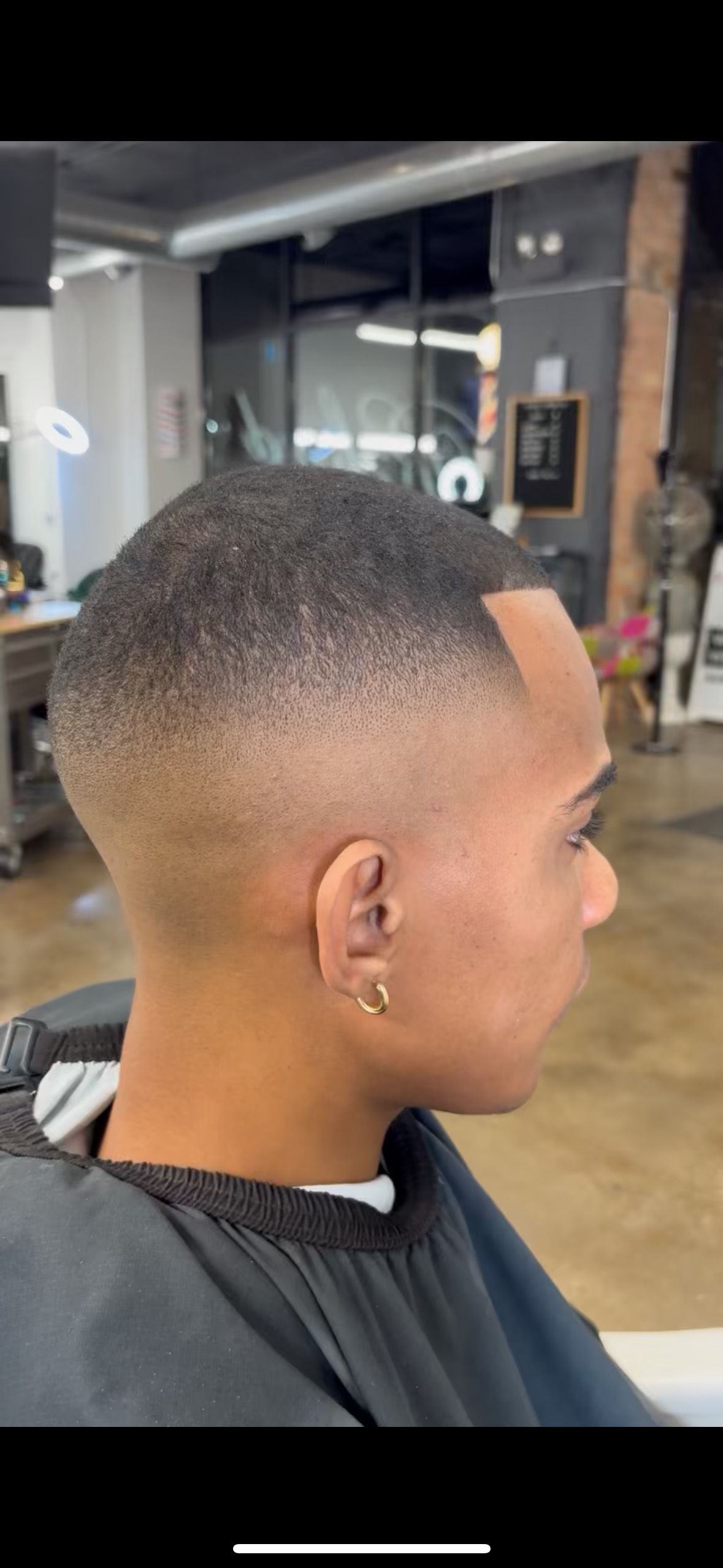 Barber Cutting Hair.